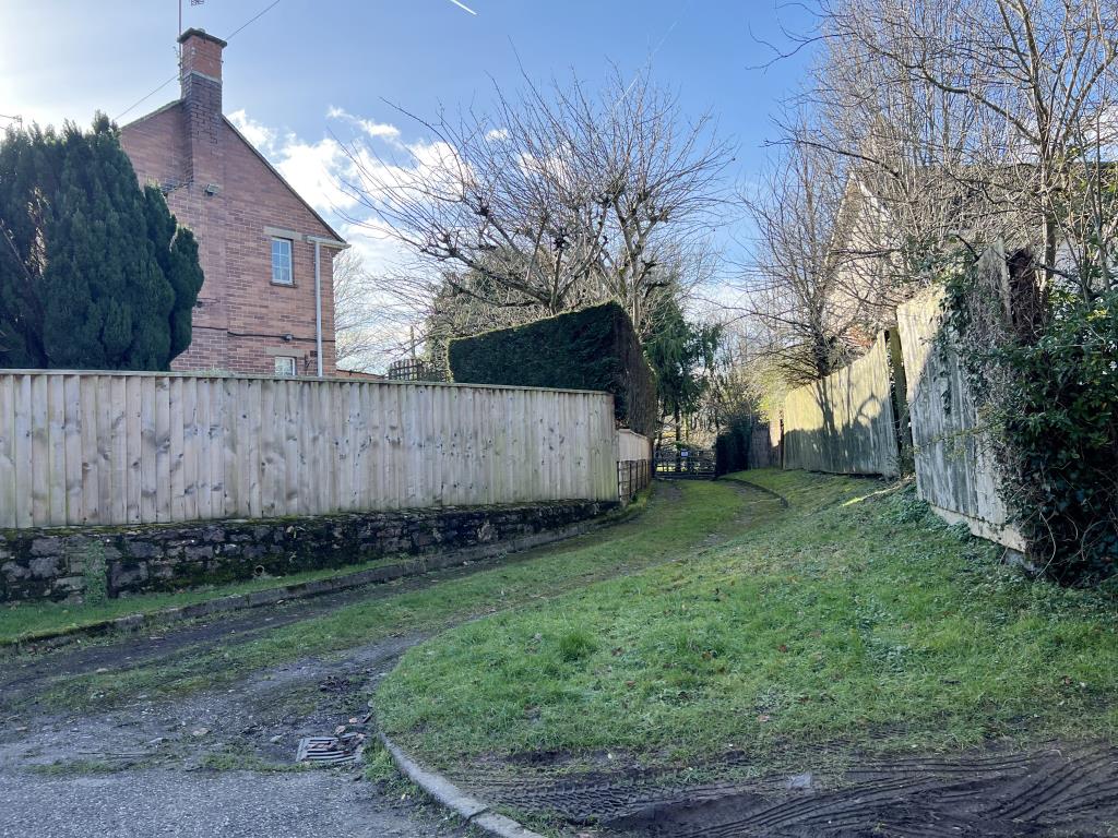 Lot: 3 - AREA OF LAND WITH ACCESS TRACK IN VILLAGE LOCATION WITH POTENTIAL - Access from roadway